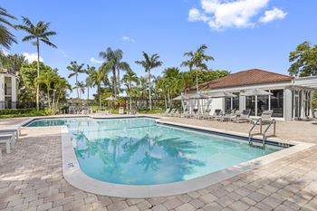Resort-style swimming pool with sundeck